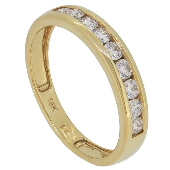 A modern, 18ct yellow gold, diamond set half eternity ring.