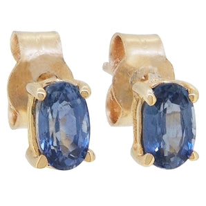 A pair of modern, 9ct yellow gold, sapphire set stud earrings.