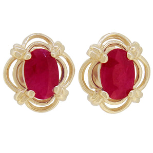 A pair of modern, 9ct yellow gold, ruby set stud earrings.