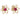 A pair of modern, yellow gold, ruby set stud earrings.