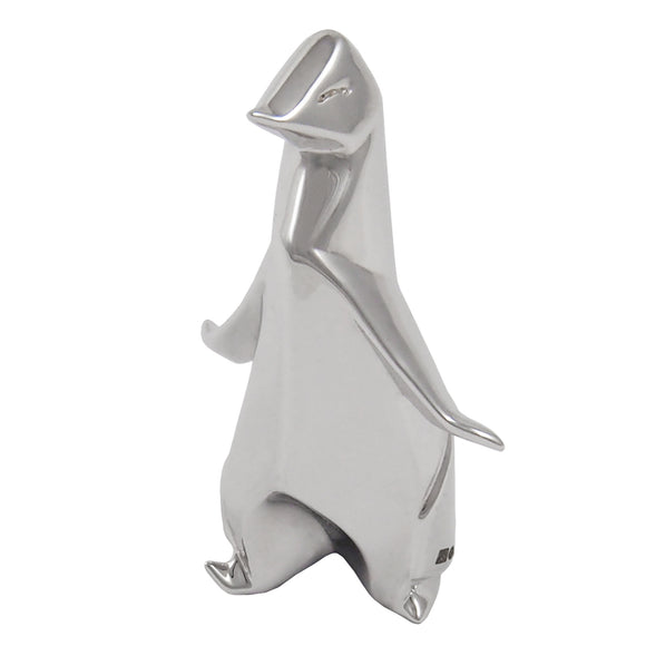 A modern, silver, origami style model of a penguin