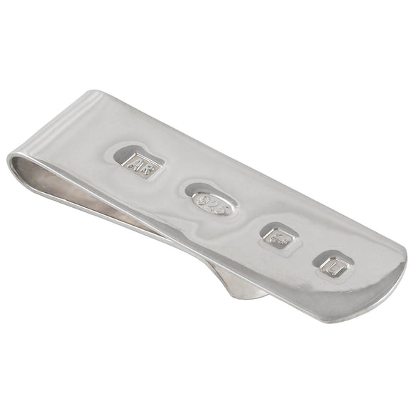 A modern, silver money clip with feature hallmarks