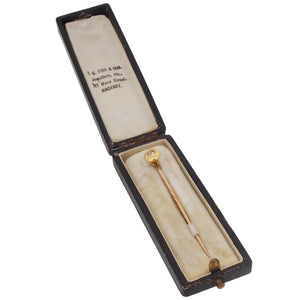 An early 20th century, yellow gold, diamond set stick pin & fitted case.