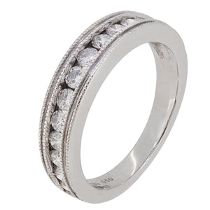 A modern, 18ct white gold, diamond set, eleven stone half eternity ring