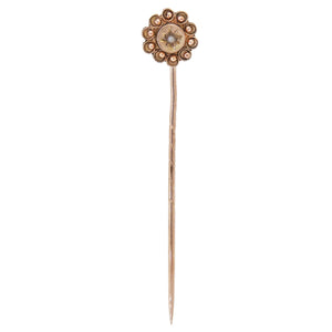 An early 20th century, 9ct yellow gold, pearl set, single stone stick pin