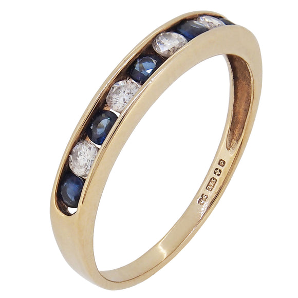 A modern, 9ct yellow gold, sapphire & diamond set, nine stone ring.