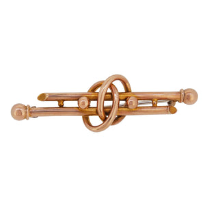 An early 20th century, 9ct yellow gold, ball & loop double bar brooch.