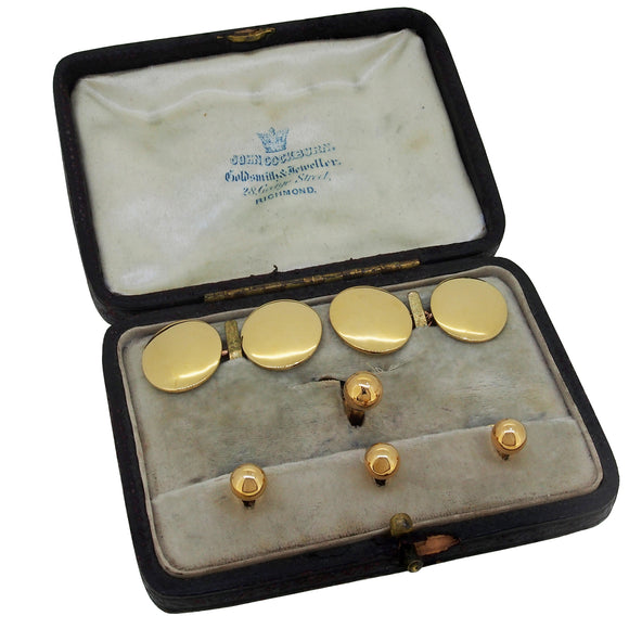 An early 20th century, 18ct yellow gold dress set & fitted case
