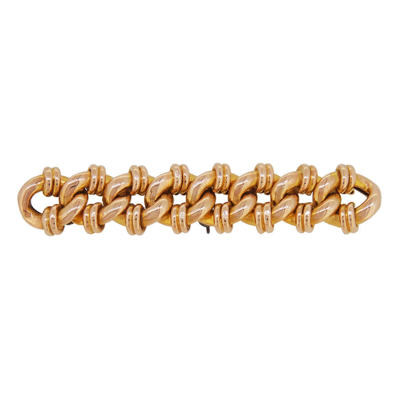 An early 20th century, 15ct yellow gold, curb link bar brooch