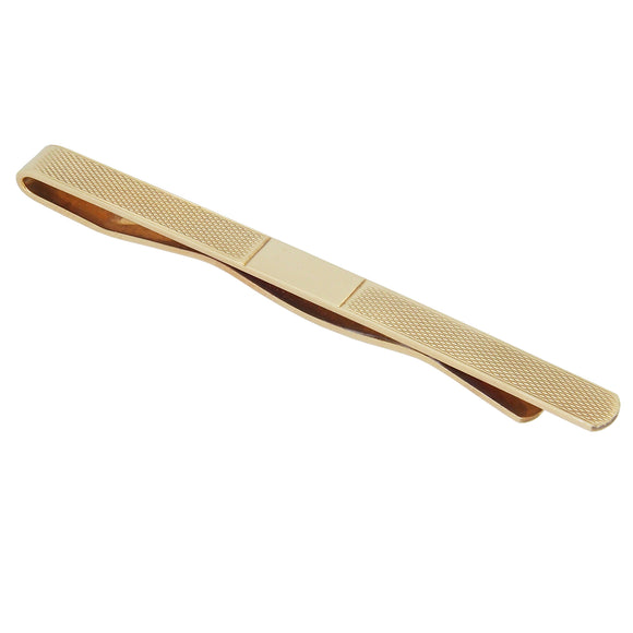 A mid-20th century, 9ct yellow gold, engine turned tie slide