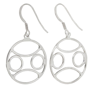 A pair of modern, silver, circular, abstract drop earrings