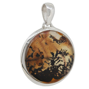 A modern, silver, moss agate set circular pendant