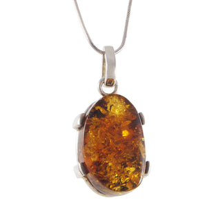 A modern, silver, amber set pendant & snake chain