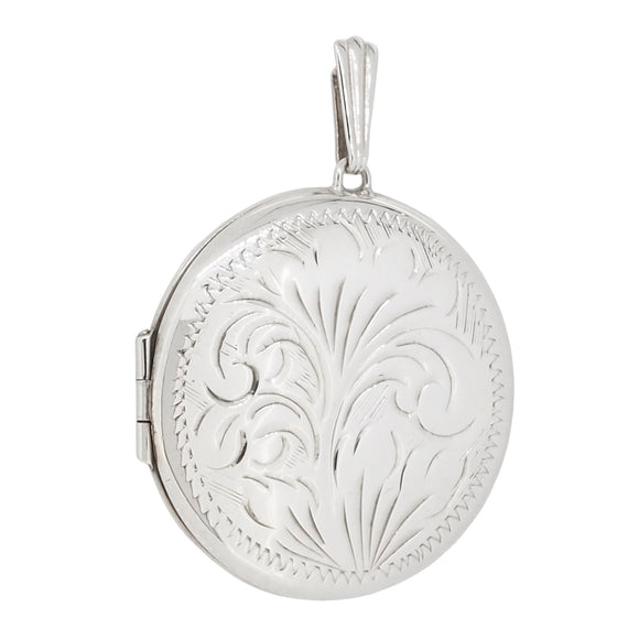 A modern, silver, engraved, circular locket