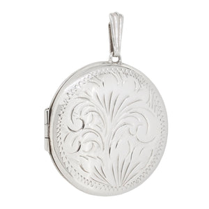 A modern, silver, engraved, circular locket