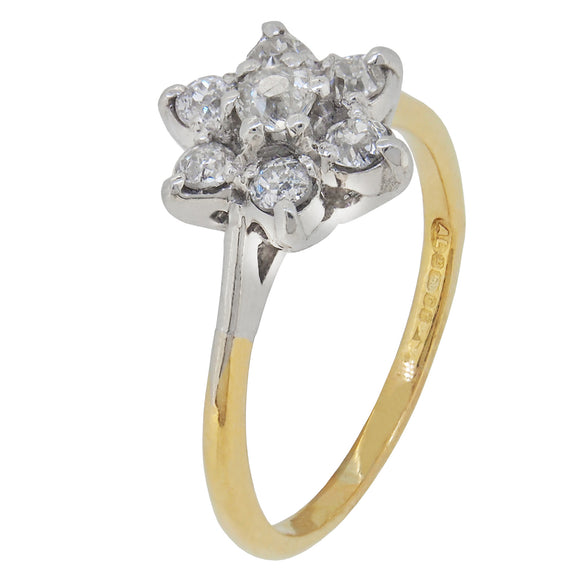 A modern, 18ct yellow & white gold, diamond set cluster ring