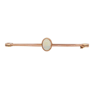 An Edwardian, 9ct rose gold, opal set bar brooch