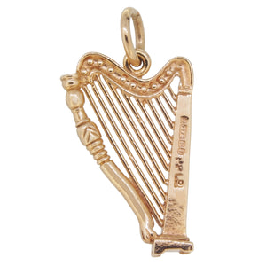 A mid-20th century, 9ct yellow gold, harp charm pendant