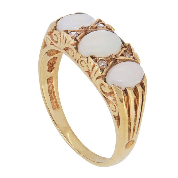 A modern, opal & diamond set, seven stone, carved half hoop ring