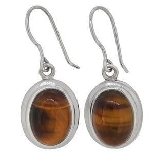 A pair of modern, silver, tigers eye set drop earrings