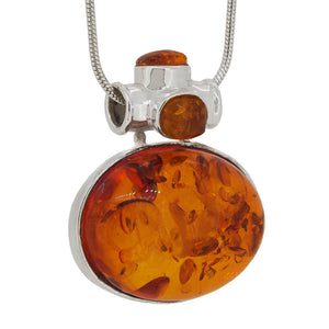 A modern, silver, amber set pendant & chain