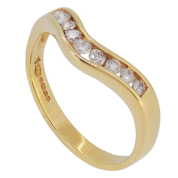 A modern, 18ct yellow gold, diamond set, nine stone, shaped half eternity ring