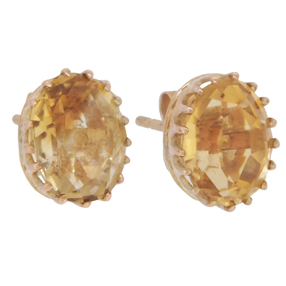 A pair of early 20th century, yellow gold, citrine set, oval stud earrings