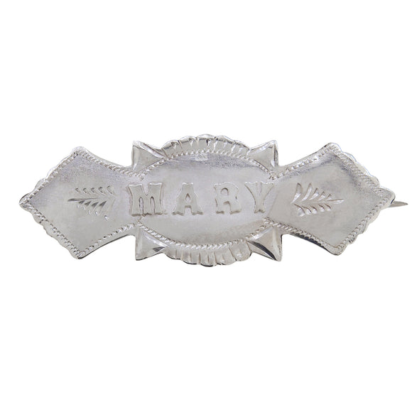 An Edwardian, silver brooch featuring the name 'Mary'