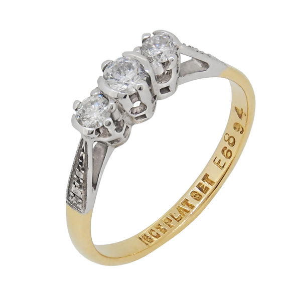 An early 20th century, 18ct yellow gold & platinum, diamond set, three stone ring.