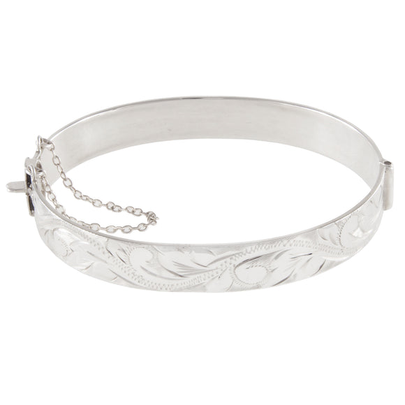 A mid-20th century, silver, half engraved, hinged bangle