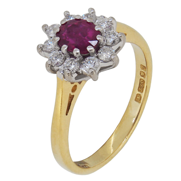 A modern, 18ct yellow & white gold, ruby & diamond set cluster ring