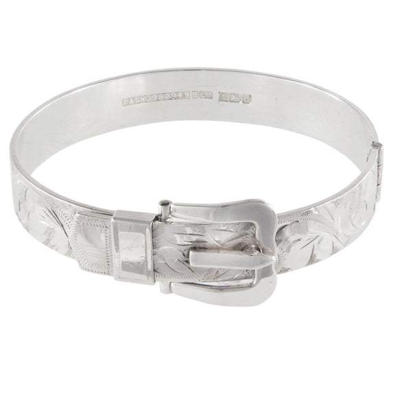 A modern, silver, engraved, hinged, buckle bangle