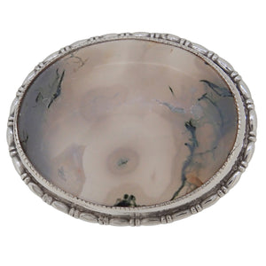 A mid-20th century, silver, oval, moss agate set brooch