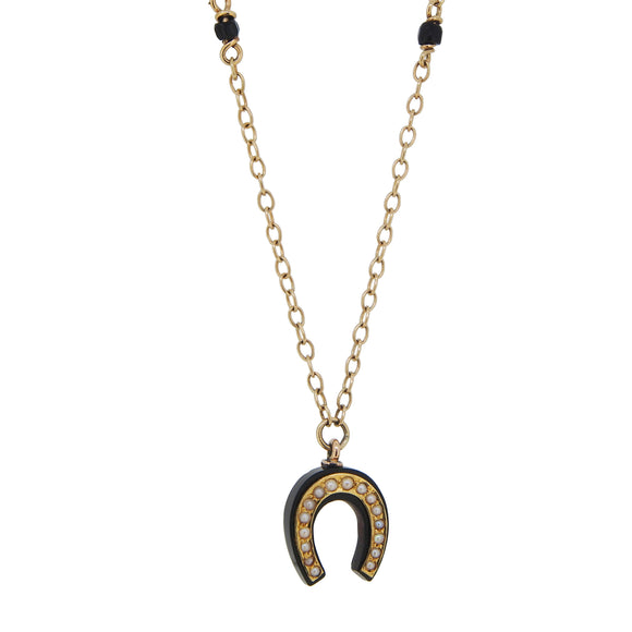 A yellow gold, black onyx & seed pearl set horseshoe pendant & chain