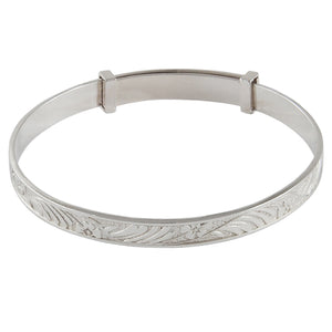 A modern, silver, child's expanding bangle.