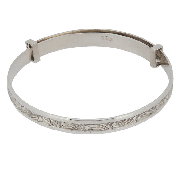 A modern, silver, child's expanding bangle