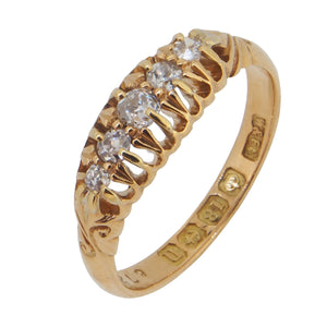 An Edwardian, 18ct yellow gold, diamond set, five stone, half hoop ring