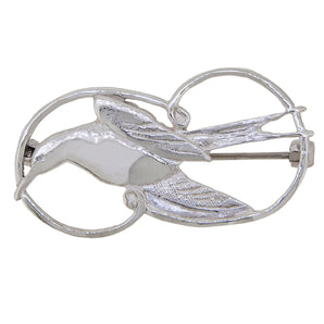A modern, silver bird brooch