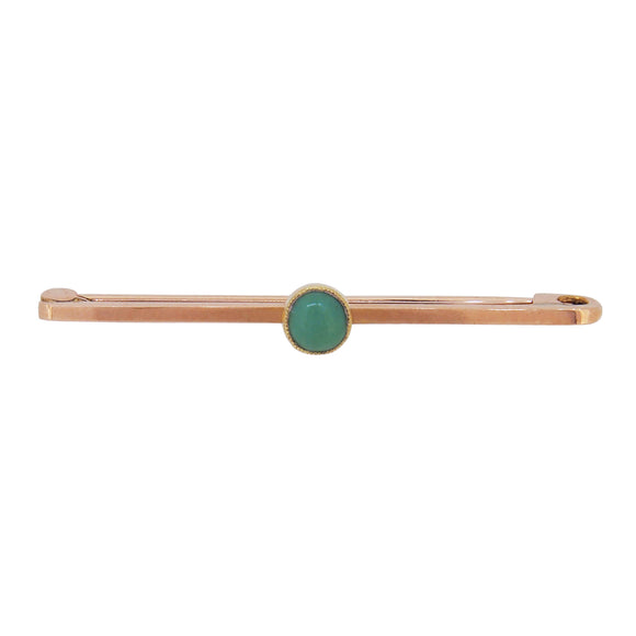 An Edwardian, 15ct yellow gold, turquoise set single stone bar brooch