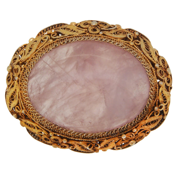An early 20th century, silver & silver gilt, rose quartz set brooch