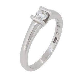 A modern, platinum, diamond set, single stone, solitaire ring