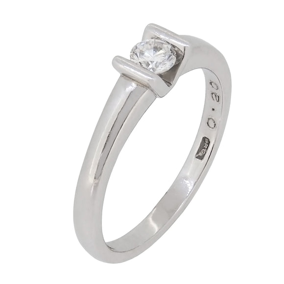 A modern, platinum, diamond set, single stone, solitaire ring