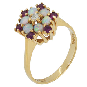 A modern, 18ct yellow gold, opal, ruby & diamond set cluster ring