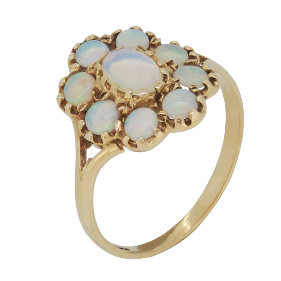 A modern, 9ct yellow gold, opal set cluster ring