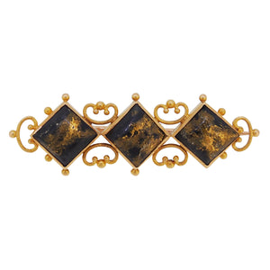 A yellow gold, green quartz set bar brooch