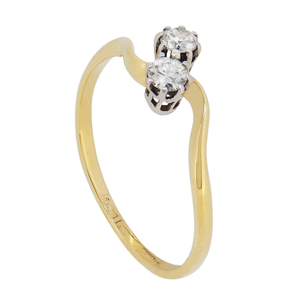 An early 20th century, 18ct yellow gold & platinum setting, diamond set, two stone crossover ring