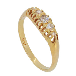 A modern, 18ct yellow gold, diamond set, five stone half hoop ring