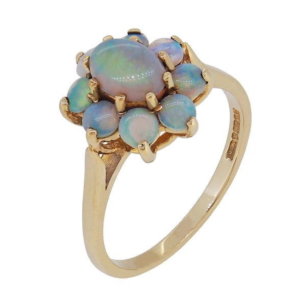 A modern, 9ct yellow gold, opal set cluster ring