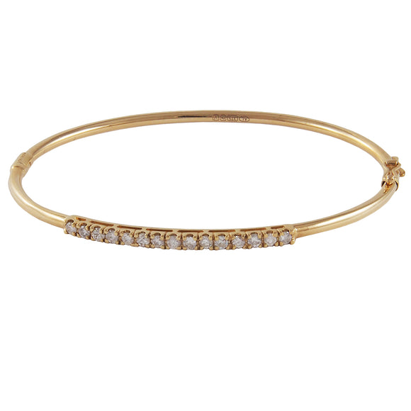 A 9ct yellow gold, diamond set, fifteen stone, half hoop bangle