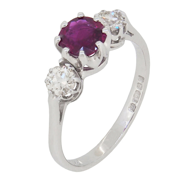 A mid 20th century, 18ct white gold, ruby & diamond set, three stone ring